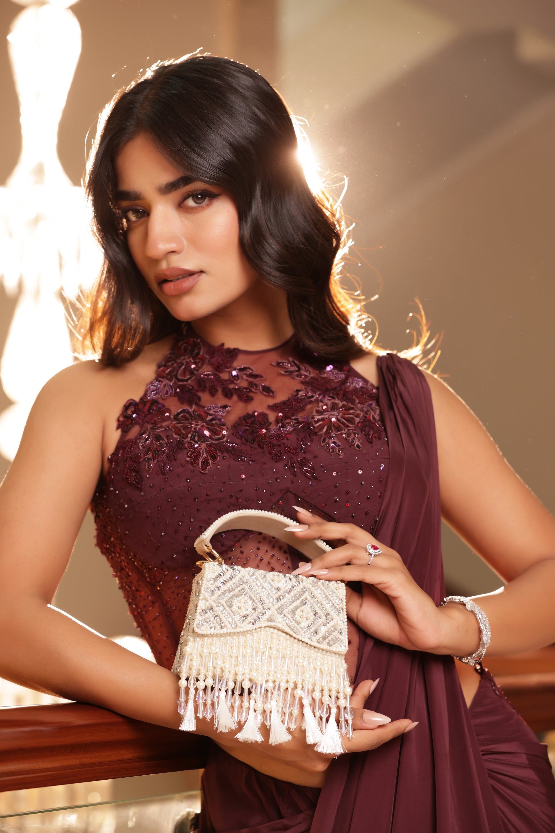 Luxury small clutch with structured silhouette and sparkling embellishments