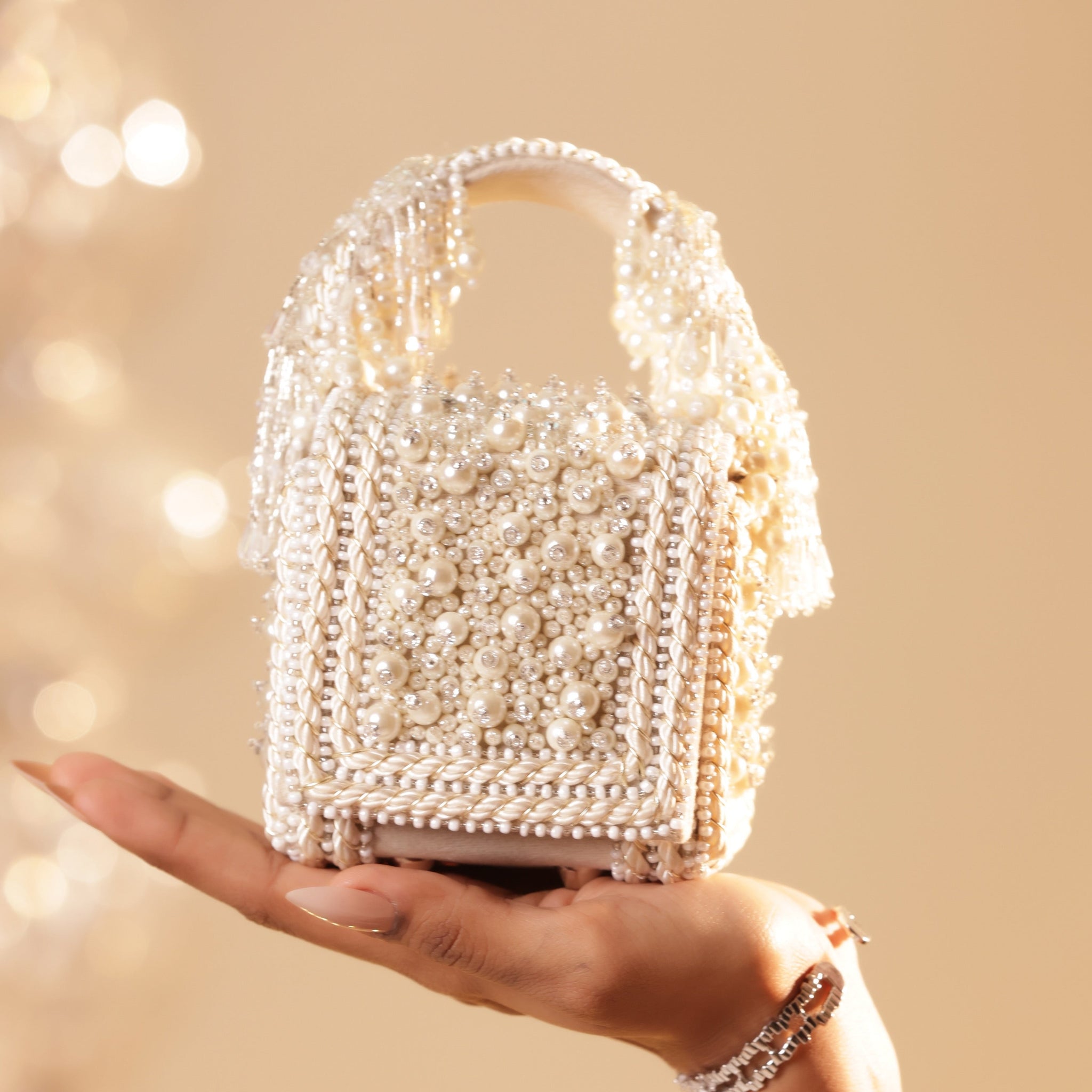 Statement small clutch with intricate embroidery and crystal accents