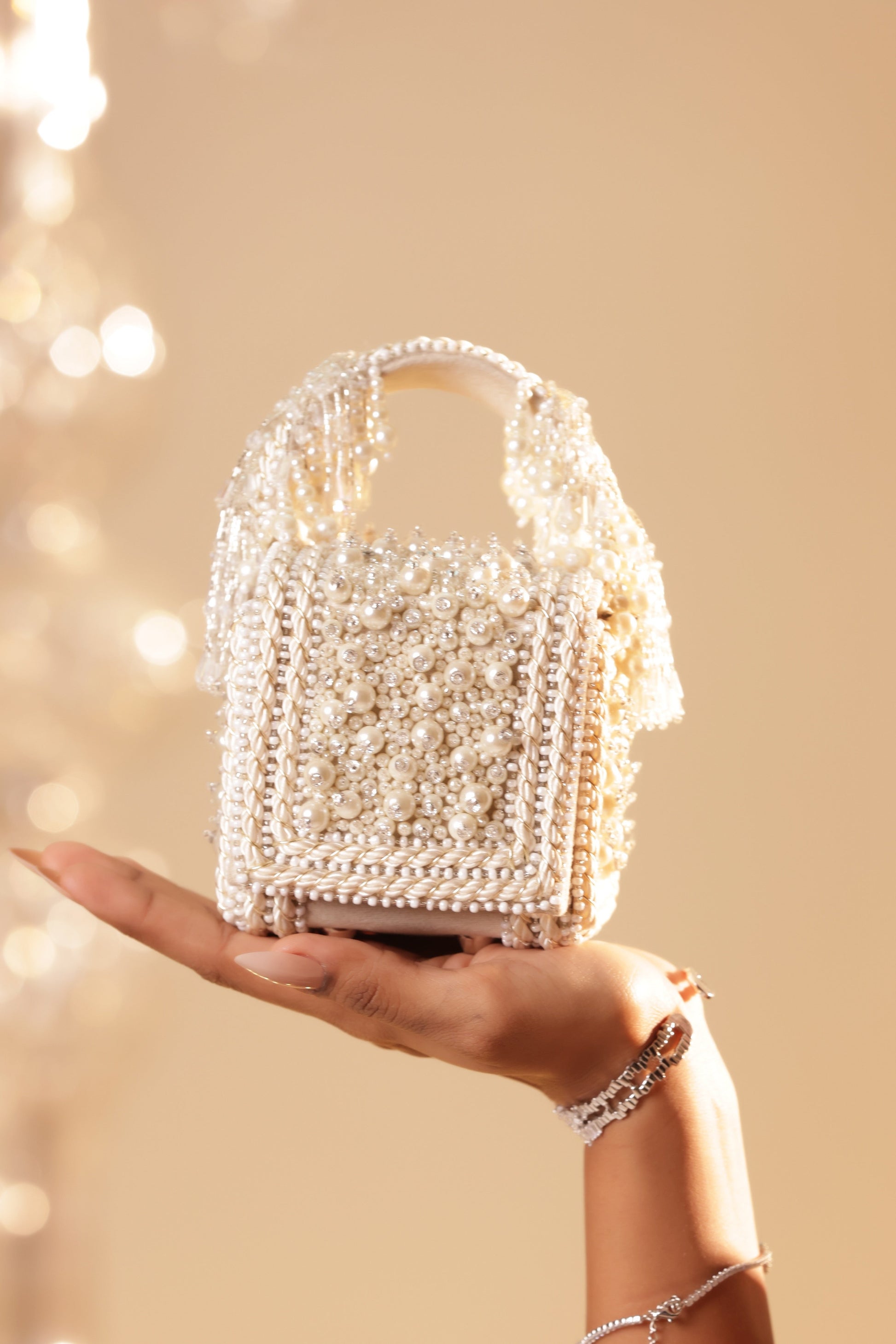 Statement small clutch with intricate embroidery and crystal accents