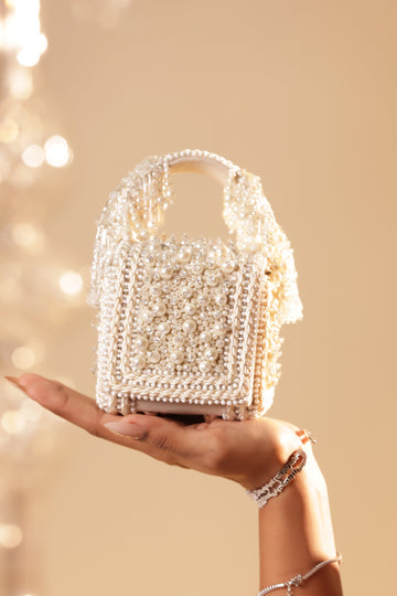 Statement small clutch with intricate embroidery and crystal accents