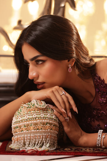 Festive evening bag with pearl and bead detailing for cocktail parties