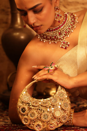 Handcrafted pearl crescent bag for weddings, sangeet, and festive celebrations