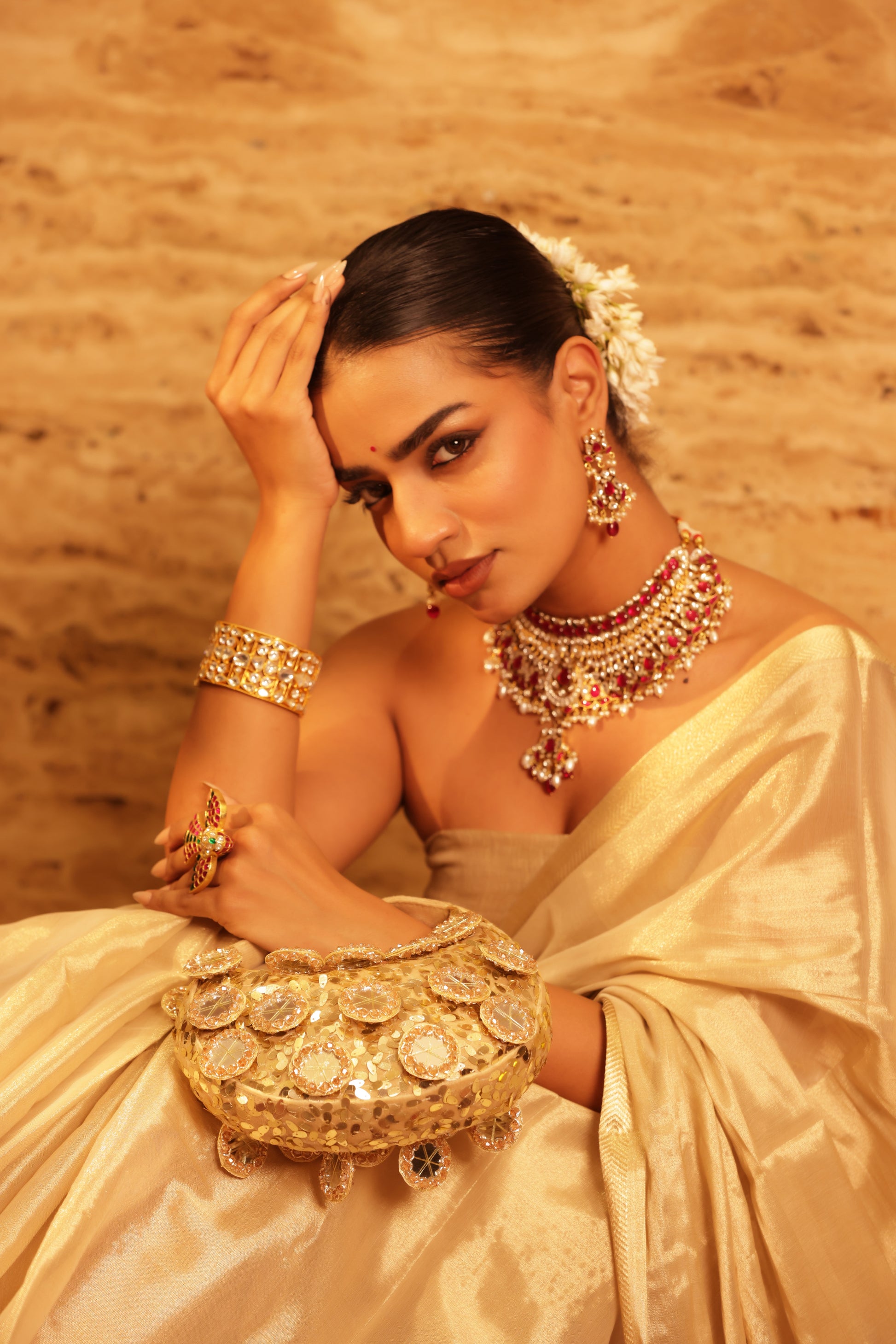 Moon-shaped designer clutch with rhinestone finish for weddings and celebrations