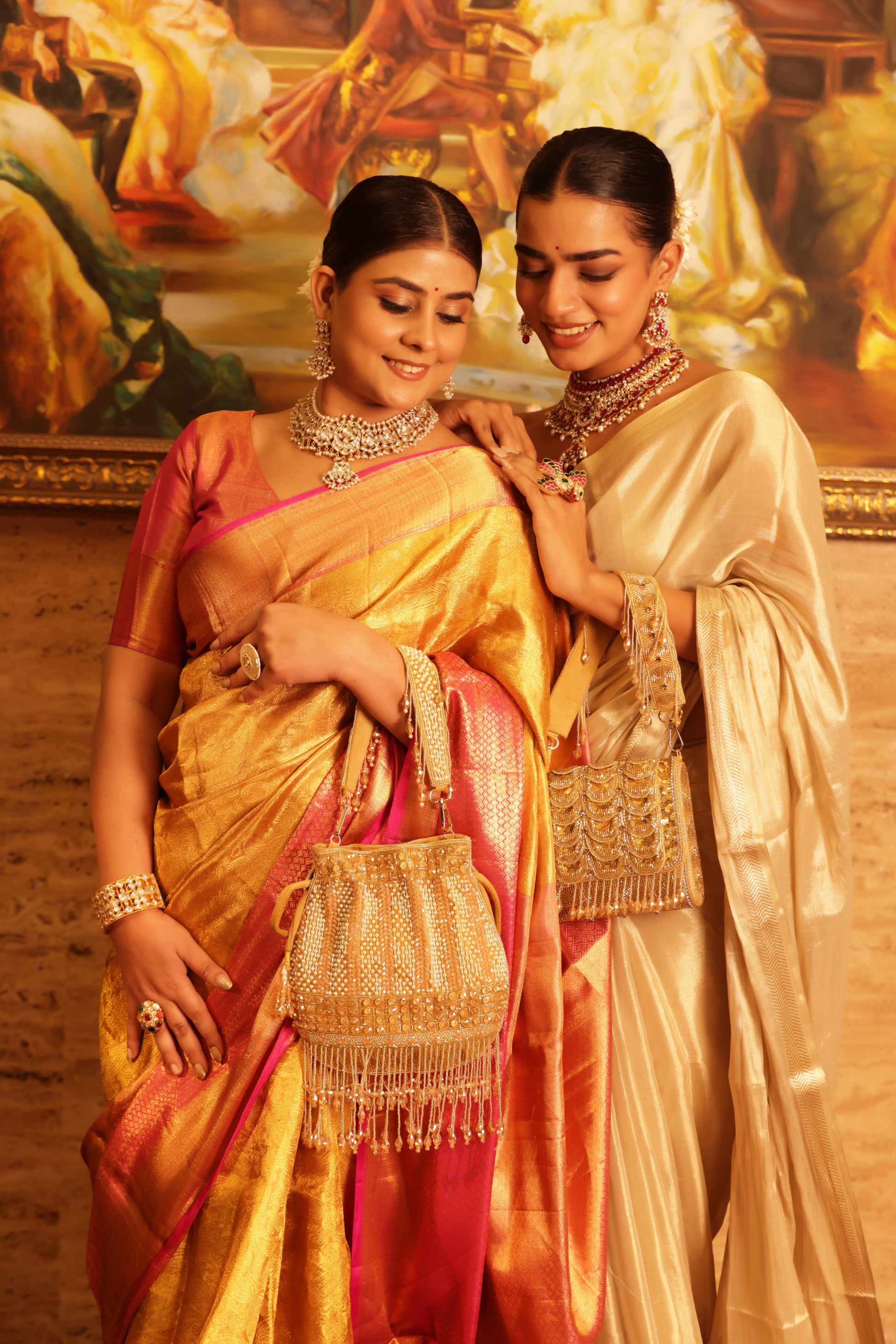 Handcrafted gold festive potli with luxurious crystal work.