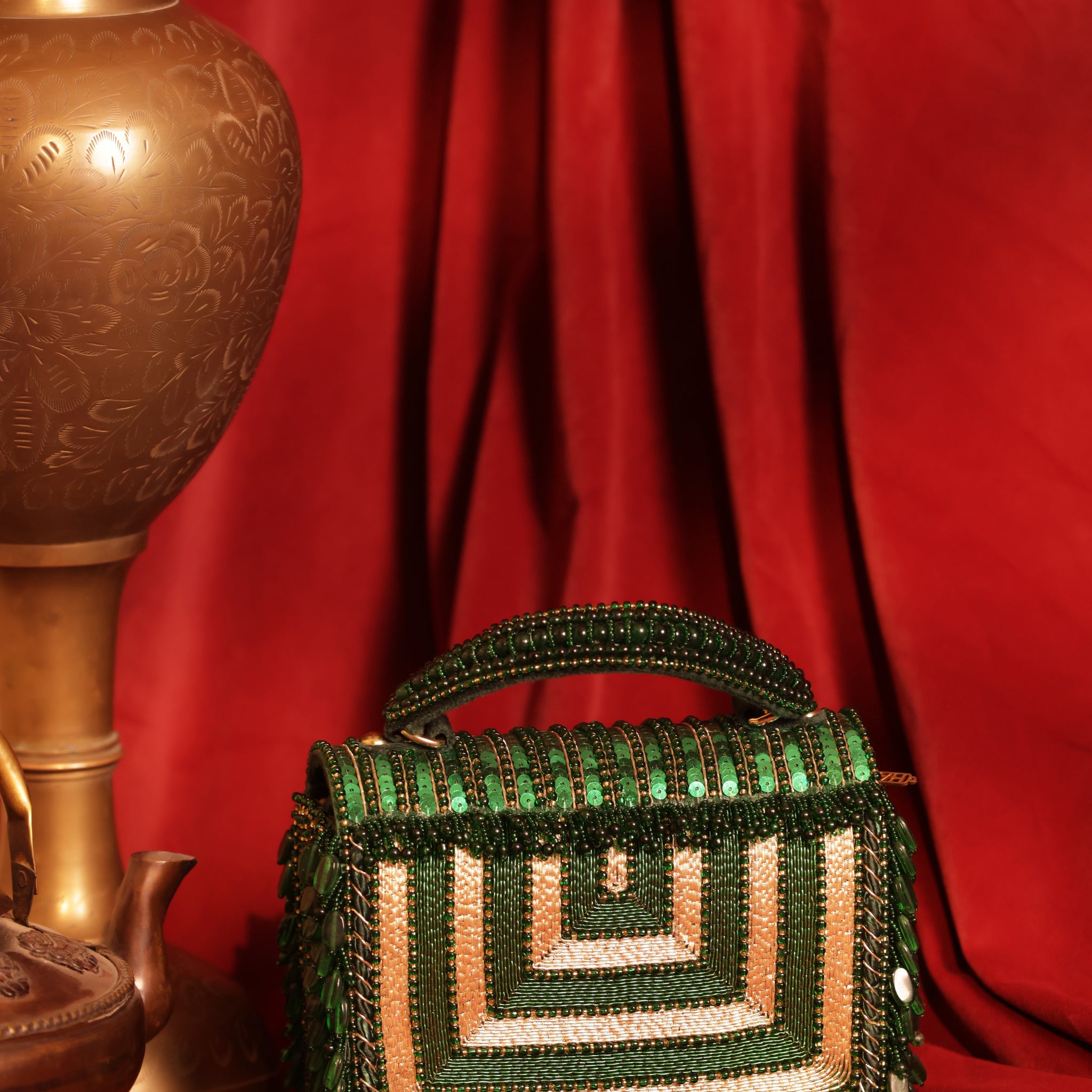 Designer evening mini bag with shimmering crystals and luxe finish