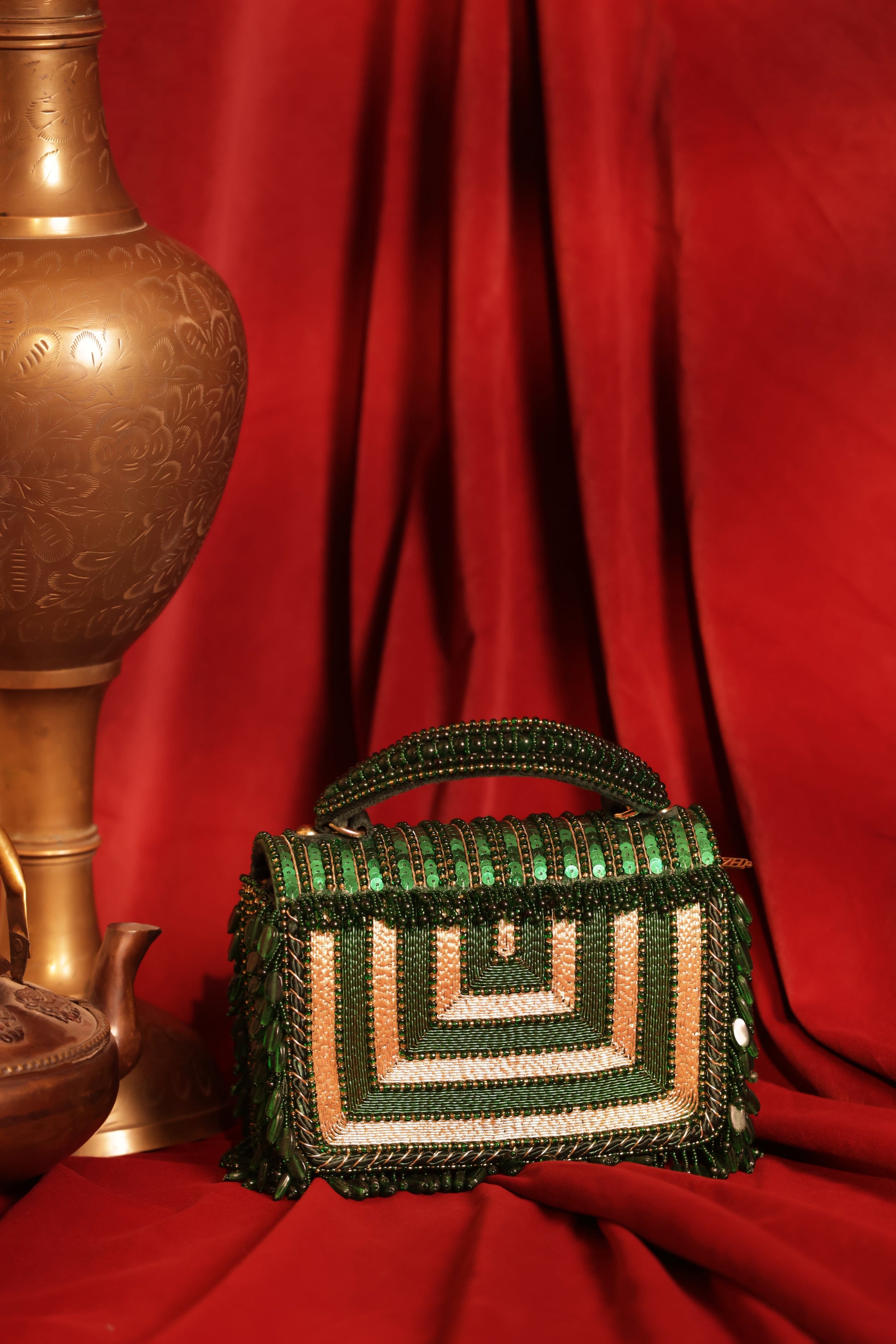 Designer evening mini bag with shimmering crystals and luxe finish