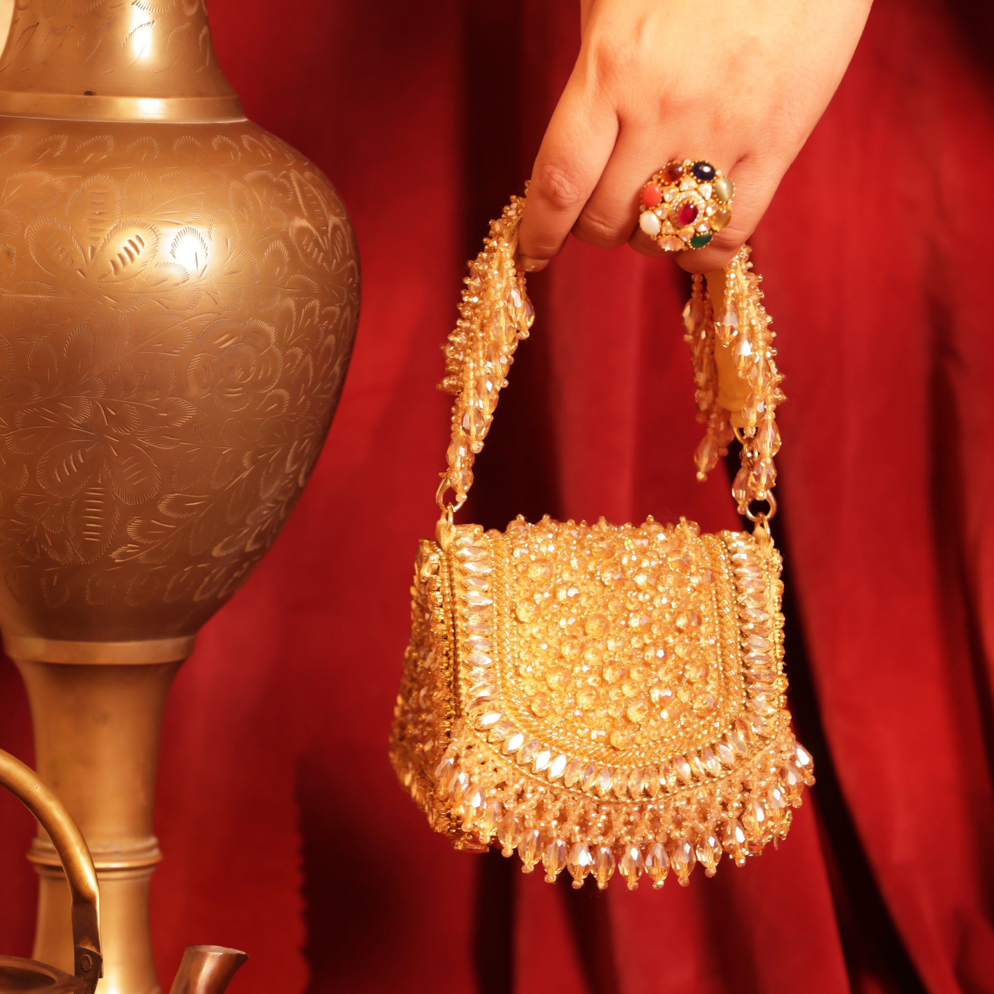 Hand-embellished bridal bag with crystals, beads, and chic tassels