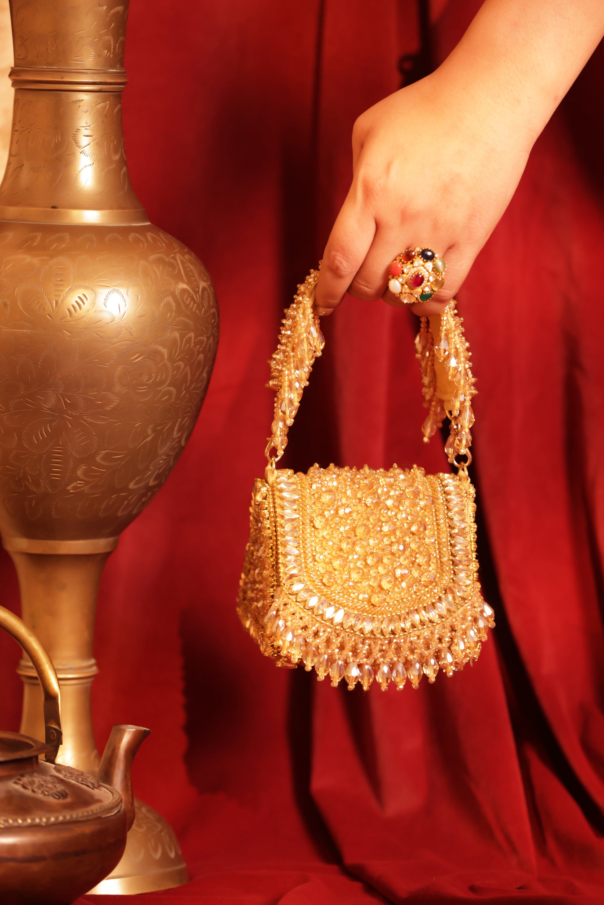 Hand-embellished bridal bag with crystals, beads, and chic tassels