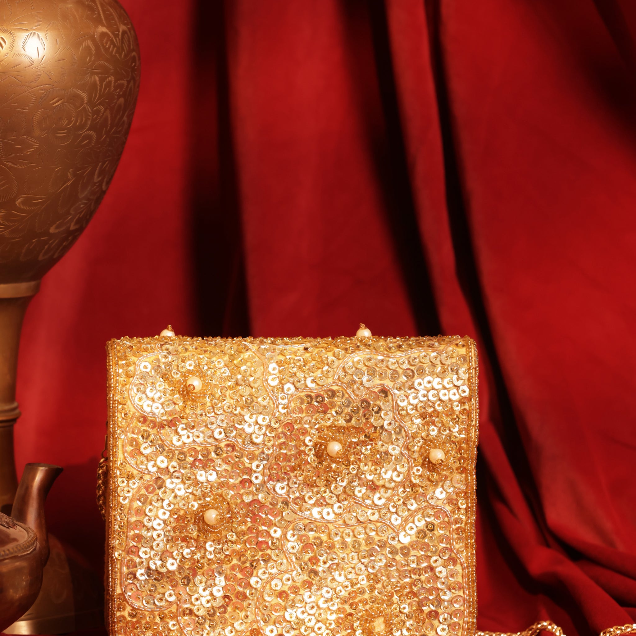 Luxury party clutch in gold, silver, or pastel tones with sparkling finish