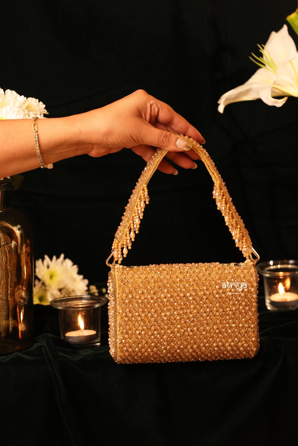 Traditional gold mirror clutch styled with Karwa Chauth and Diwali festive celebration decor