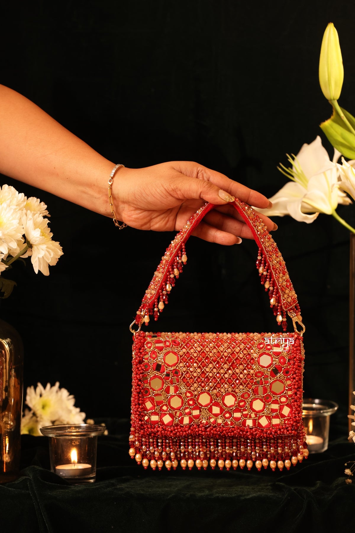 Traditional Indian red evening clutch with beaded handle, ideal wedding guest and bridal accessory