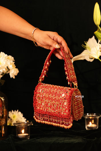 Royal crimson red embellished mirror clutch pars bag styled for Karwa Chauth and Diwali outfits