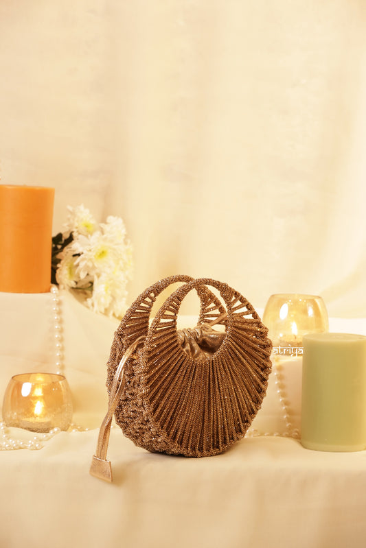 Atriya Stardust Gold Luxe handcrafted circular crystal clutch with inner metallic drawstring pouch