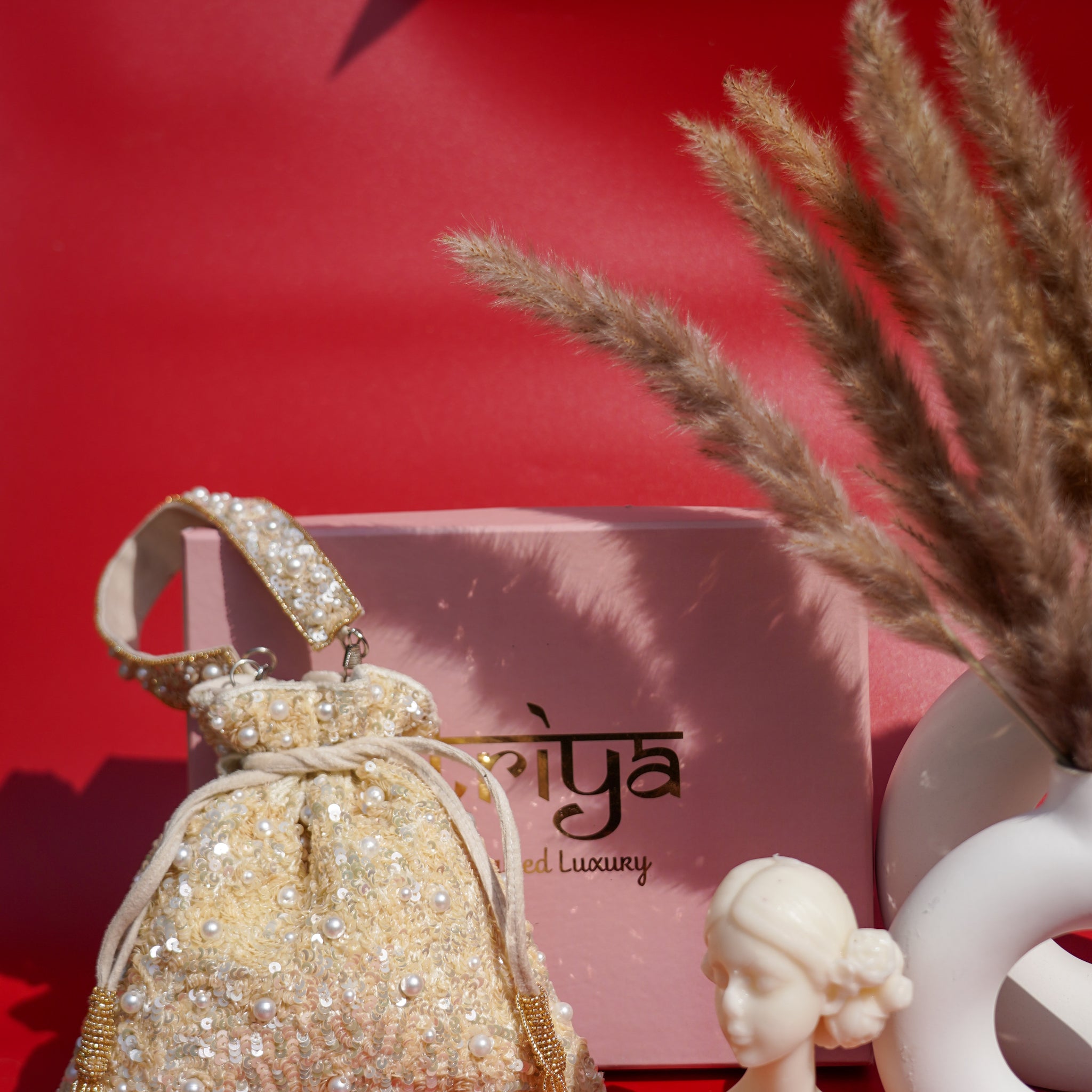 Pearl Strings Potli
