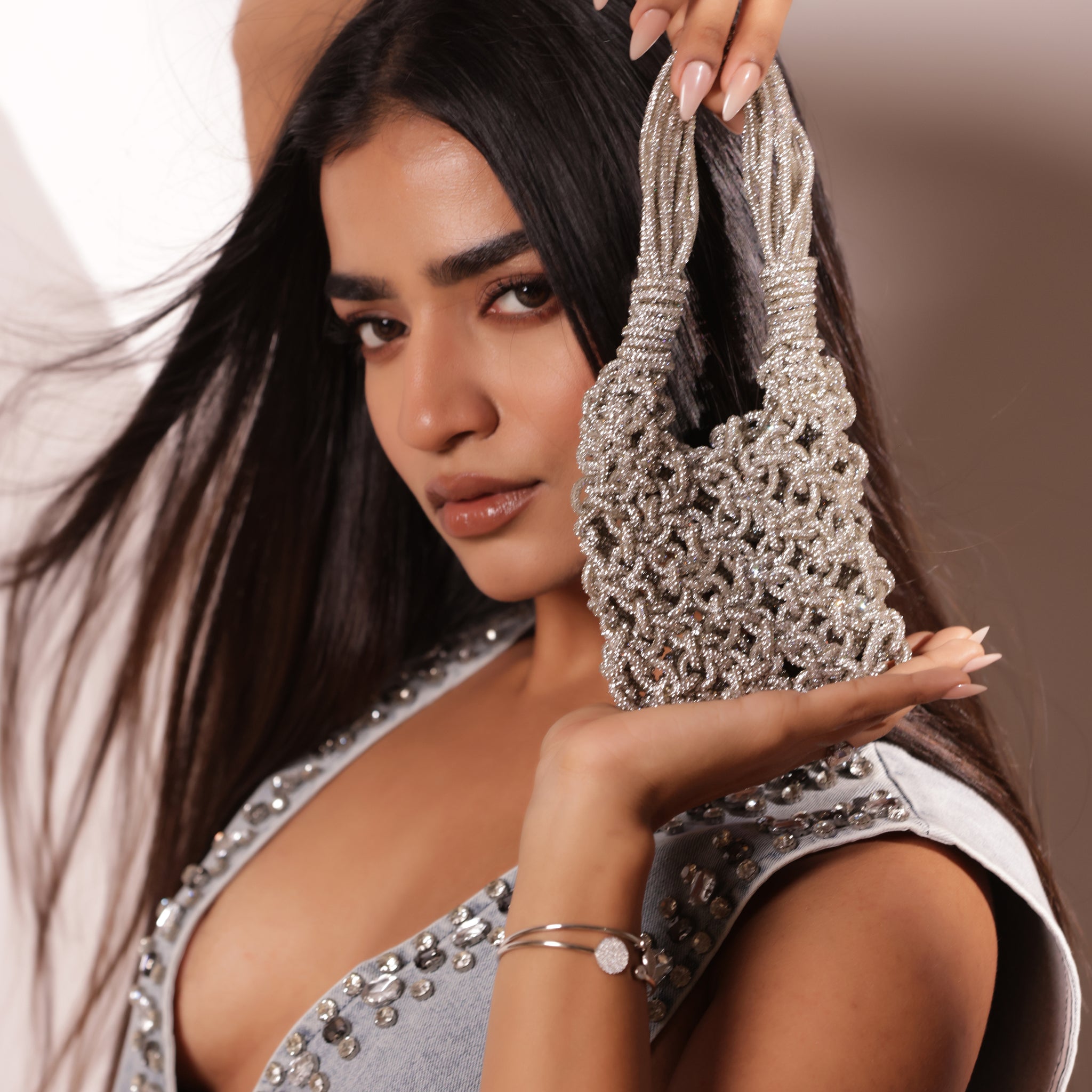 Mini rhinestone bag with hand-embellished crystals and pearl detailing