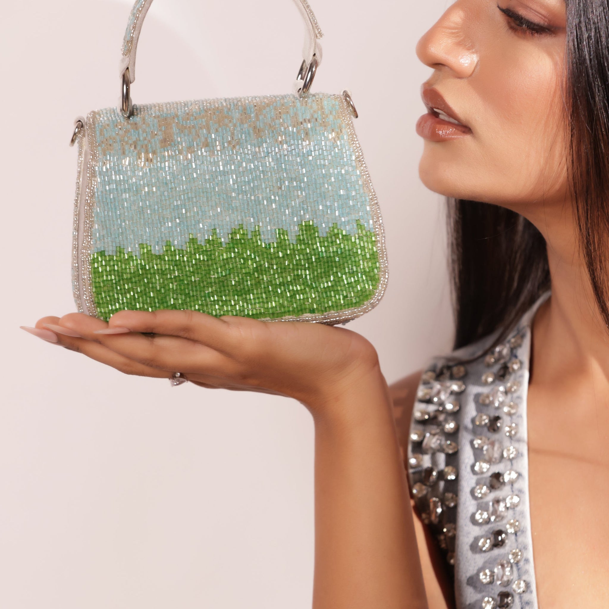 Luxury mini rhinestone bag with cascading fringe and intricate beadwork