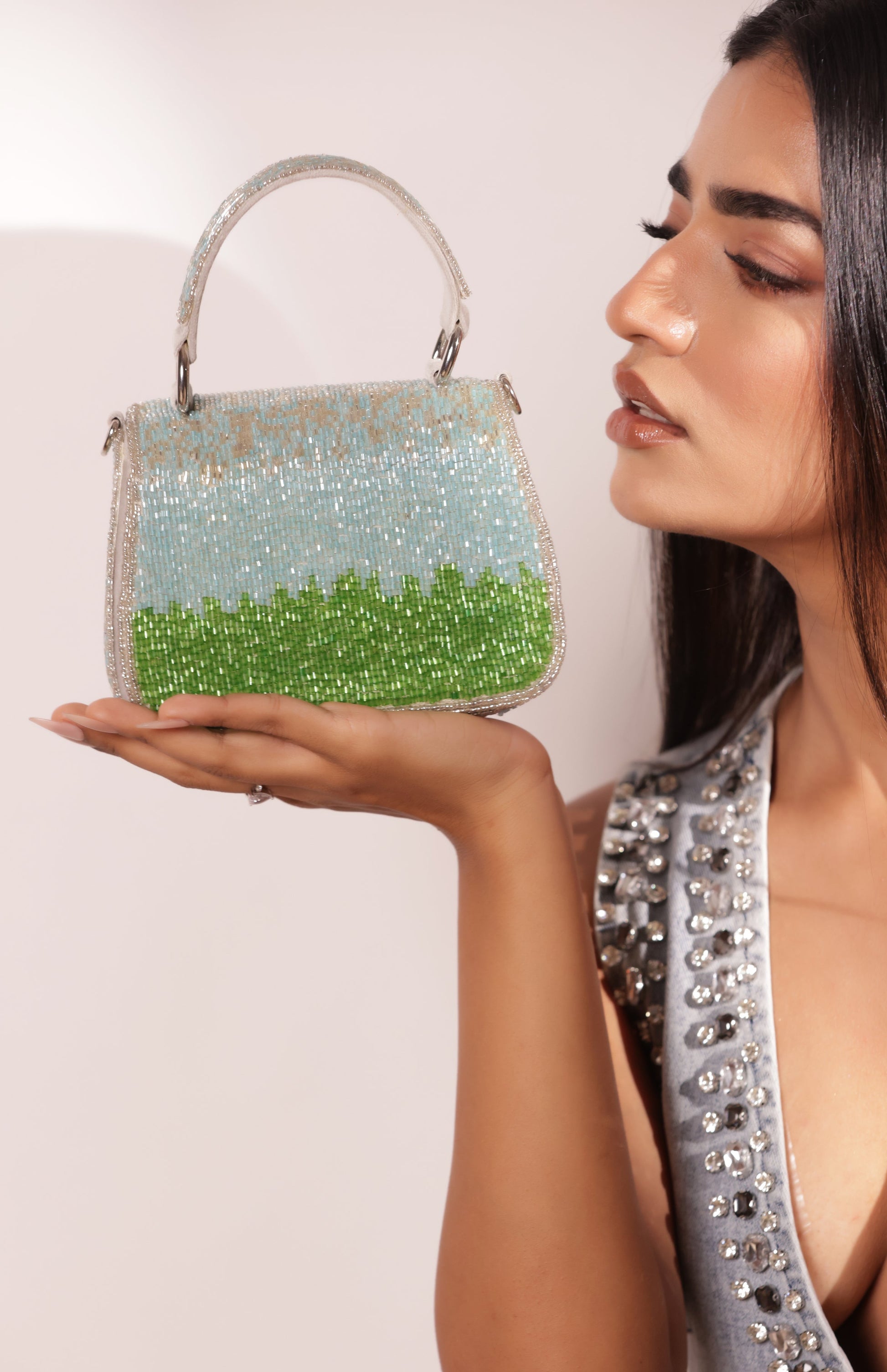 Luxury mini rhinestone bag with cascading fringe and intricate beadwork