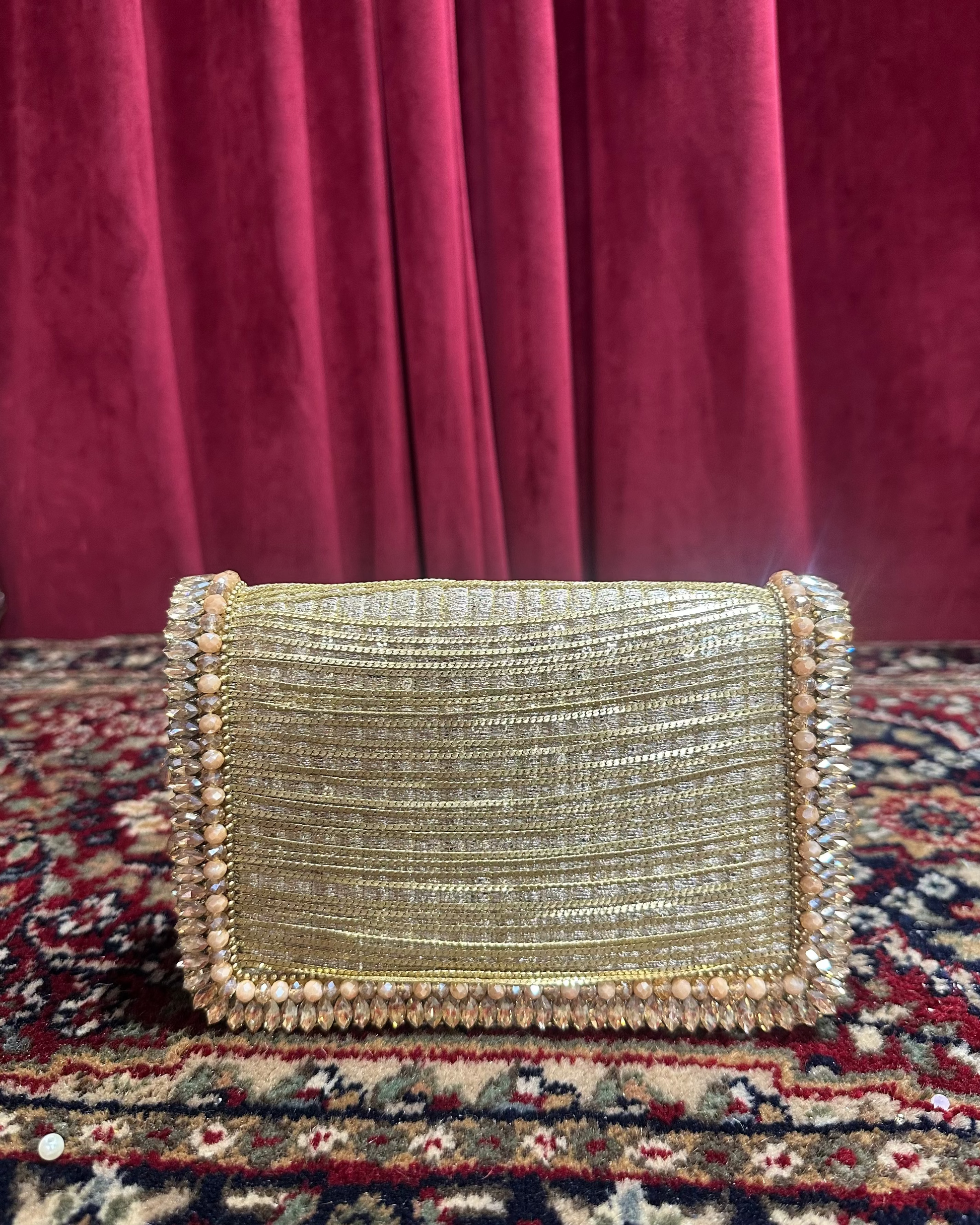 Designer 7.4 x 4.8 x 1.9 inch gold embellished party handbag with magnetic flap closure and beaded shoulder handle