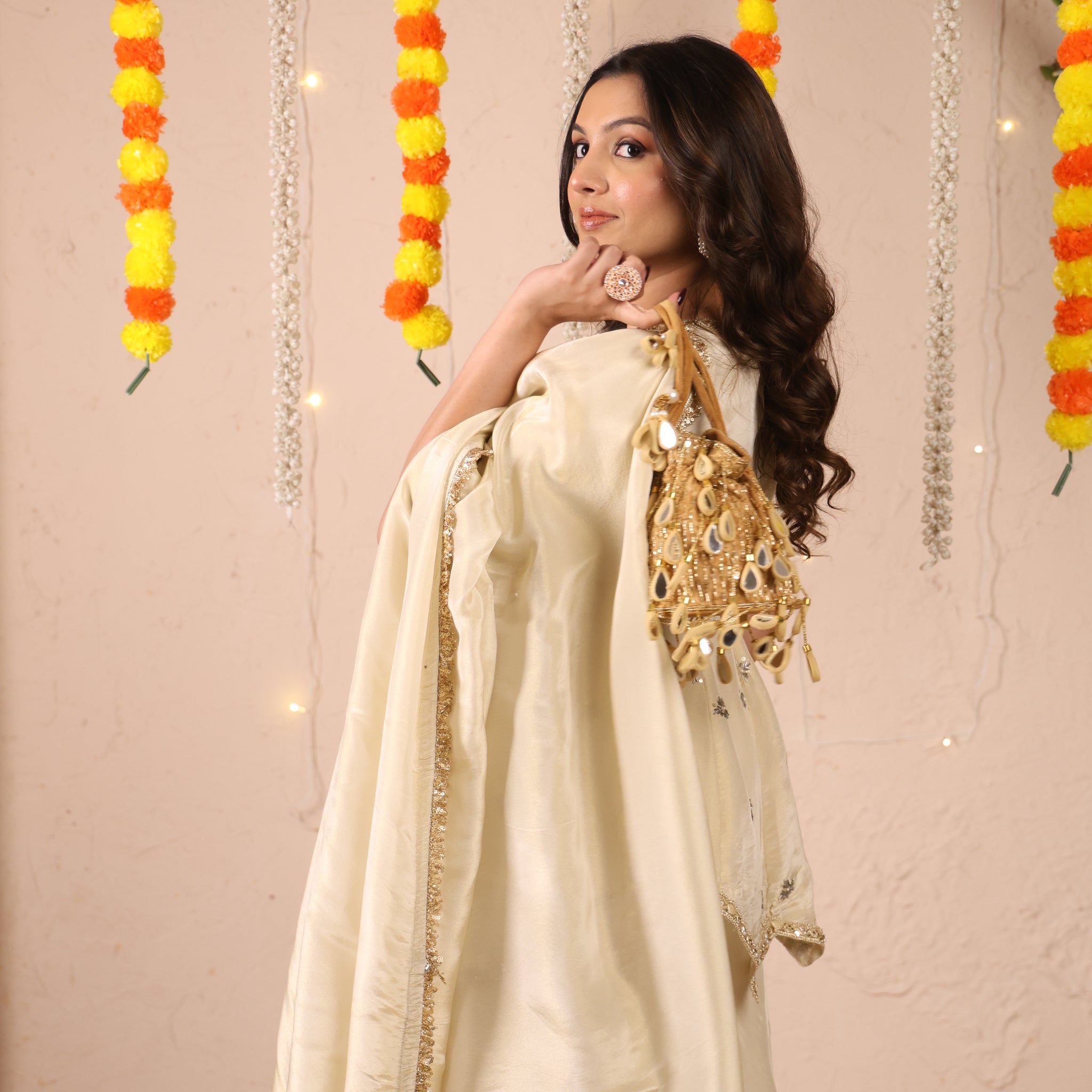 Handcrafted festive bag for weddings, sangeet, and mehendi ceremonies